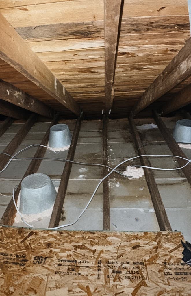 Sealing gaps and penetrations in a Charlotte-area attic during air sealing