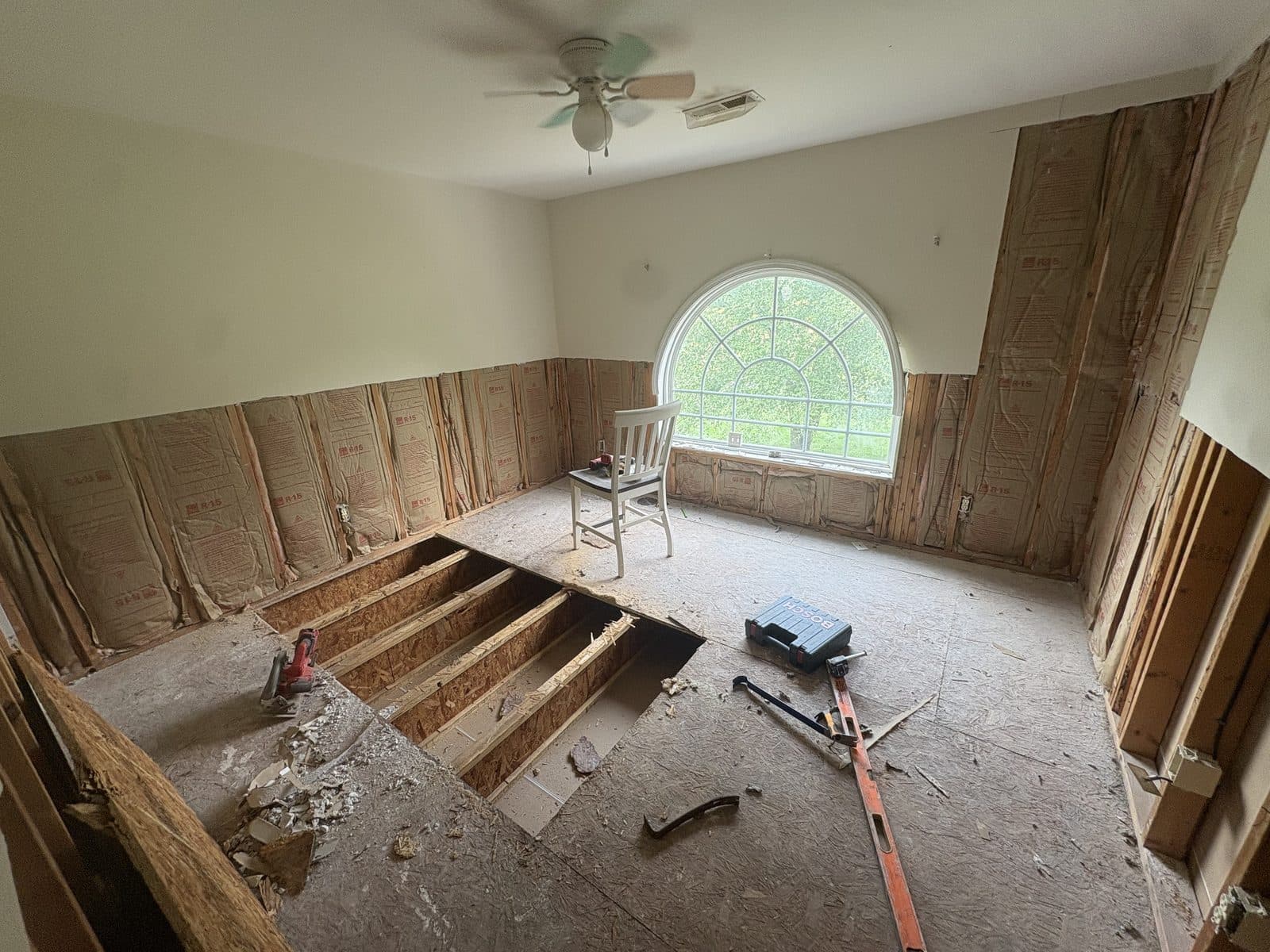 Kraft-faced batt insulation installed in the wall cavities of a Charlotte-area home